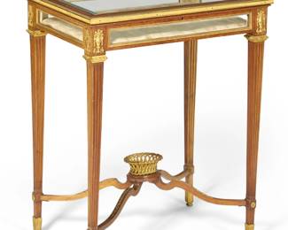 A Louis XVI style gilt bronze mounted mahogany vitrine table
late 19th century