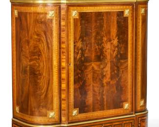 A Louis XVI style gilt bronze mounted mahogany, tulipwood, amaranth, sycamore and parquetry side cabinet
early 20th century