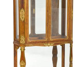 A Louis XIV style parcel gilt and green painted figured walnut vitrine cabinet
late 19th/early 20th century