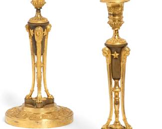 A pair of Empire gilt and patinated bronze candlesticks
early 19th century