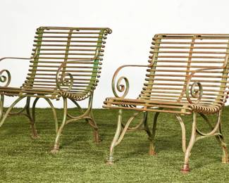 A pair of French wrought iron garden armchairs
Arras
early 20th century