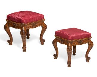 A pair of Continental Rococo walnut stools
second half 18th century