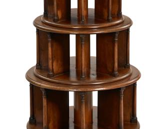 A Continental mahogany three tier revolving bookcase
19th century