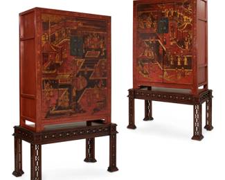 An imposing  pair of Chinese black, gold and scarlet painted cabinets on stands
