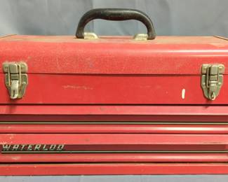 Metal Toolbox With 2 Drawers And Hinged Lid, Some Contents Include Bicycle Pump, Coping Saw, Some Hardware, And More