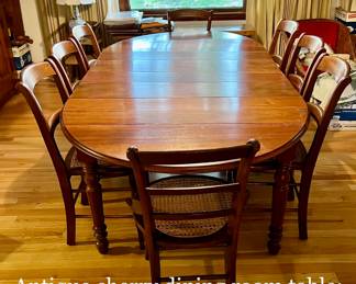 Cherry dining table - actually is has 6 cane chairs - the other 2 are similar but not exact