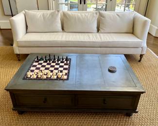 Restoration Hardware metal clad table. Sofa not for sale.