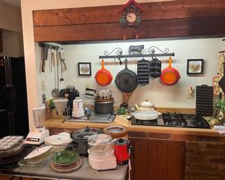 Cast iron skillet and cookware small appliances fiesta bowls, 1950's. leCreuset, wagner 