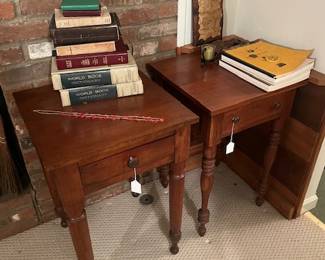 Two primitive end tables 