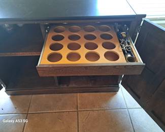 Here's the pull out rocks glass holder. $250.00