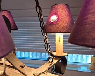 One lampshade has a burn mark 