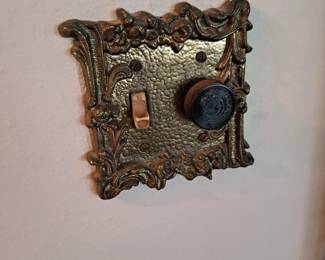 One of the many original outlet covers $10 for double plates,  $7 for single plates