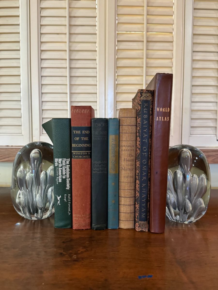 There is a collection of vintage and antique books.