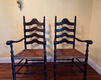 Late 19th century antique French Country Style Ladderback chairs with rush seats - sold as a set.  They have a beautiful aged patina and the weave on the seats are intact.