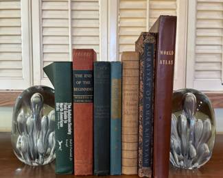 There is a collection of vintage and antique books.