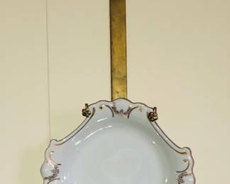 Many wall plate hangers and plates