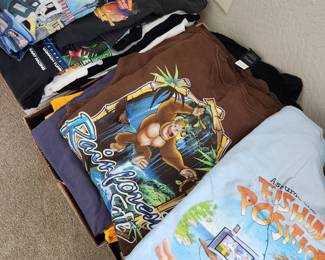 Over 300 Collectible  Graphic T-Shirts. Lots of them! Harley-Davidson, Bands, In-And-Out Burger, other businesses, etc. 