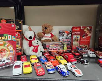 A collection of Coca Cola items. 