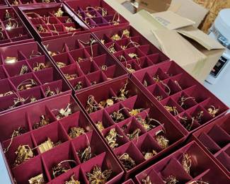 A fantastic amount of gold karat over brass Christmas Ornaments. 