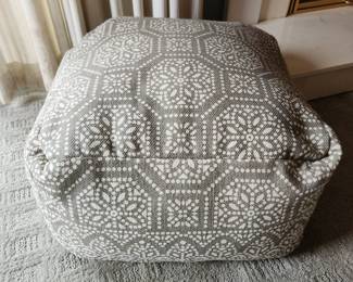 Gray and white pouf ottoman