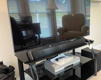 large flat screen TV and TV stand