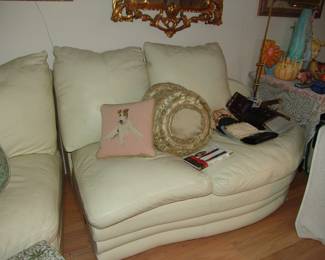 Two leather sectional sofas