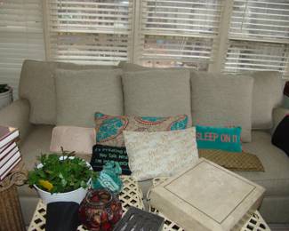 Nice neutral upholstered three cushion sofa, like new 
