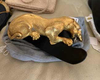 Gold plated lunging jaguar belt by designer Christopher Ross