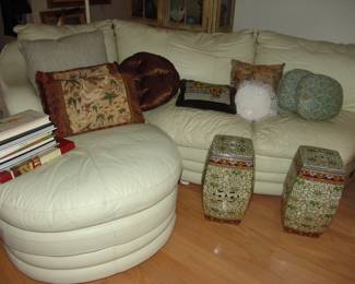 Leather sectional sofa and two porcelain garden seats