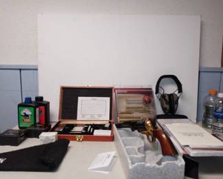 Black Powder Pistol, with Accessories and Rifle Cleaning Equipment