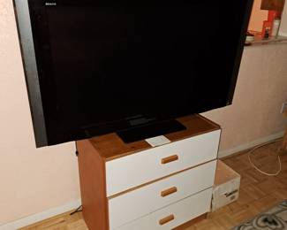 Flat screen TV,  3 drawer dresser $45