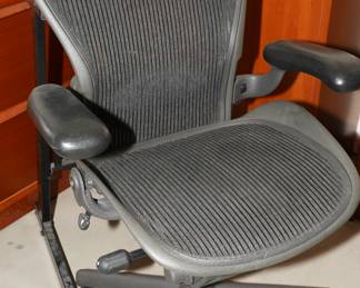 Rolling mesh office chair with metal base, adjustable