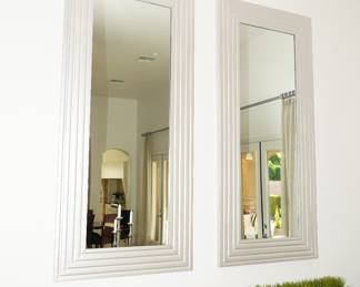 Paneled white wood framed wall mirrors x 2