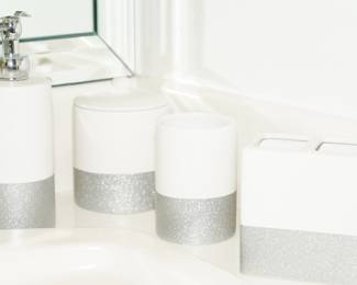 These bathroom accessories are being sold as sets