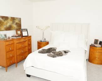 Baker Furniture inlaid dresser and nightstands, paneled high back leather wrapped bedframe