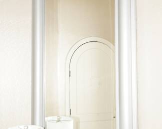 Gray framed wall mirror