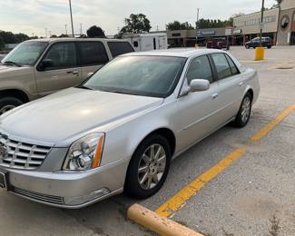 This estate car is a 2011 Cadillac  DTS with low miles (aprox 68,000). Excellent shape!
The family has just authorized a $2000 reduction in their original asking price of $12,000.