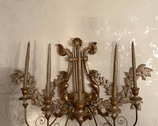 Dining Room: A vintage 5-arm wall sconce measures 40" wide x 24" tall and includes the perfect gold candles.