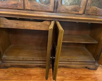 Dining Room: The lower section of the STANLEY china cabinet is now open. There is a flatware drawer on the left and shelves on the right for lots of storage.