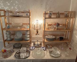Dining Room: An assortment of crystal; china (Jyota "Leona" and Lynmore "Romance"); and Silverplate is displayed among an electric 5-arm candelabra with crystals.