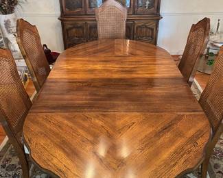 Dining Room: The STANLEY dining table and six chairs are priced separately from the STANLEY china cabinet. The table measures 43" x 43-1/2" and includes two 18" leaves, as shown. The next photos show the table base and one of the six dining chairs.