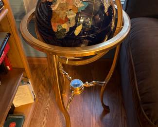 Family Room-Main Floor: This gemstone globe on brass stand as a subtle crack but is still very handsome.