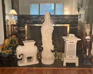 Living Room: Fabulous Asian decorative items are displayed in front of the fireplace. We moved things around a bit for the photos. . . . keep going . . . .