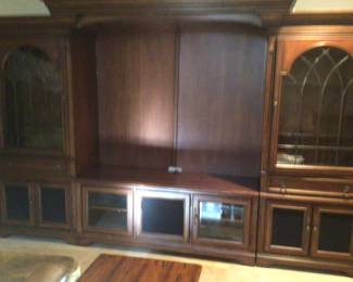 Large entertainment center with leaded glass doors