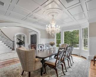 RALPH LAUREN HOME Tradtional mahogany double pedestal table seats 10, set of 6 Queen Anne style chairs, pair of wing back host and hostess chairs;  Sarouk style wool handmade carpet