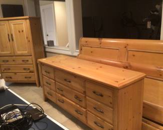 Stripped pine bedroom set with king size bed, triple dresser, nightstand, high chest