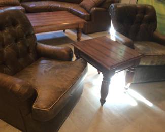Pair of leather armchairs and end table