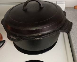 Griswold #8 covered dutch oven with drip plate.