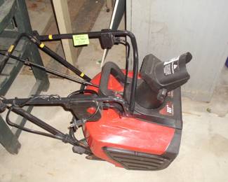 Electric snow thrower.