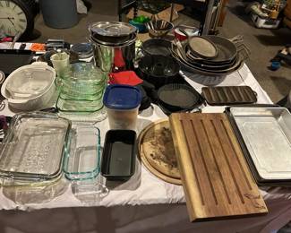 Casserole dishes, pyrex, bread pans, pizza stones, cutting board, cast iron skillets, large stock pots